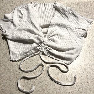Very soft light scrunched v neck white crop top with strings